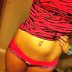 Low-rise panties and belly ring
