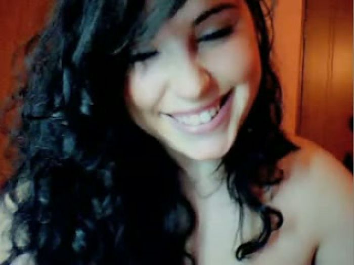 Cute brunette undressing on webcamera